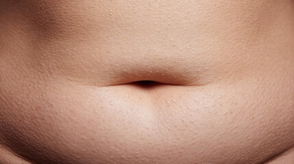 Close-up View of Belly Fat Fold Being Squeezed on Neutral Background Highlighting Skin Texture and Pores