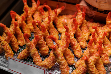 Deep fried shrimp snacks lined up at asian street market