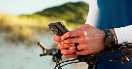 Phone, bike and fitness with hands on beach for cycling route, training app and communication. Workout guide, online cyclist map and direction search with person typing outdoor for exercise progress - Powered by Adobe