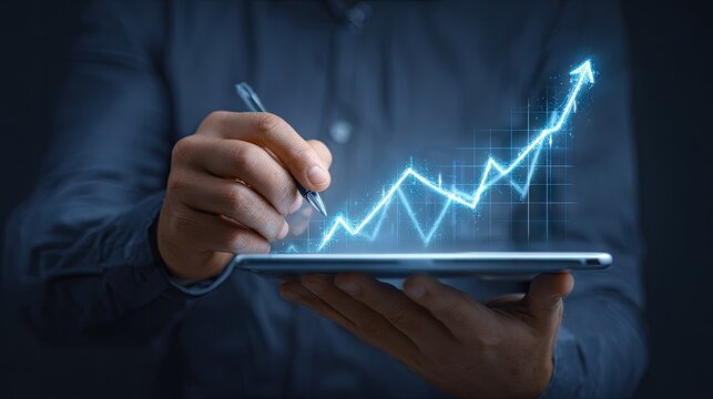 Business growth concept person holding tablet with glowing arrow chart