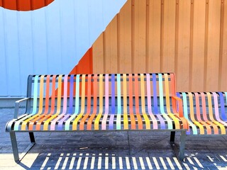 Colorful bench in front of building