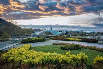 Modern bridge over Kura River, view from Rike Park in Tbilisi, Georgia © Fotokon