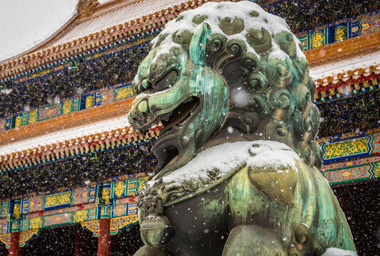 Guardian lion sculpture in front of Gate of Supreme Harmony in Forbidden City, main tourist attraction in Beijing, capital city of China