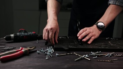 Carpenter Marking Particle Planks In A Workshop To Make A Decorative Shelf For A Home