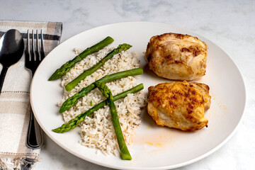 chicken thighs  with  asparagus and rice
