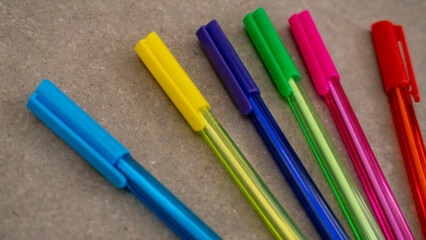 close-up of many colored pens