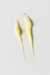 Light Yellow Cosmetic Texture Smear on White Background