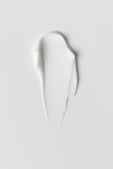 White Cream Smear on Light Background