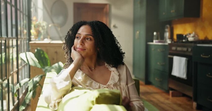 Smile, woman and thinking at window on sofa with daydreaming, self reflection or mental break. Weekend, peaceful person and calm morning in living room with mindfulness, happy memory or relax in home