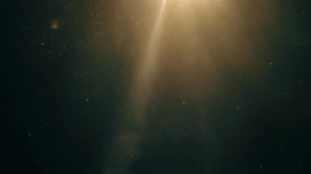 sun rays in the sky, sun rays through the clouds, sun rays through the clouds, Floating dust particles illuminated by ray of light in dark room, cinematic mood