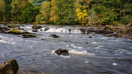 Start of the Falls of Dochart, which is a series of rapids on the River Dochart in the village of Killin, Scotland, in the Trossachs National Park