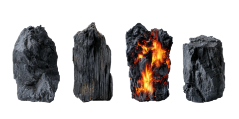 Four pieces of charcoal, one ignited, against a dark background, showing texture and light