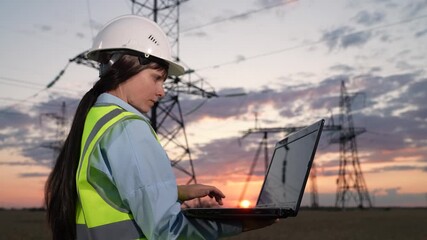 Woman at electric tower with computer, real-time monitoring in the energy field, fieldwork using advanced technology, resilient workforce in utilities, professional woman at power line site - Powered by Adobe