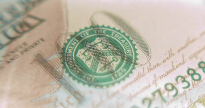 Department of the Treasury stamp on the 100 dollar bill macro view