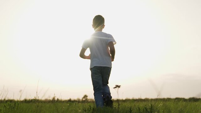 boy son child running airplane game flight dream playground green field sunset pilot, fun flying playtime, child on green field, child sunset plane game, young boy airplane passion, playtime at dusk - Powered by Adobe