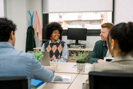 Diverse business team collaborating during an engaging office meeting