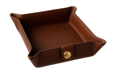 Leather tray with button clasp, ideal for organizing remotes and chargers in any room.
