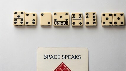 Close Up of Dominoes with Unique Text and a Gap