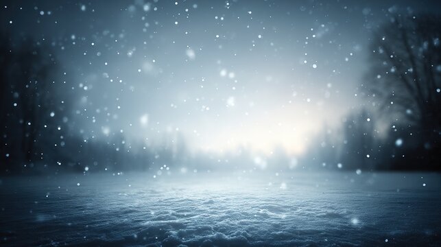 Beautiful snow-covered winter landscape with falling snowflakes, blurred trees and hills draped in white snow, evoking a serene, magical and peaceful cold season atmosphere.