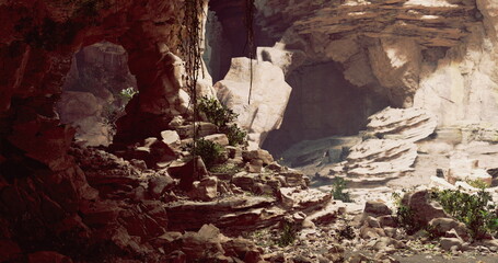 Rugged rock formations dominate the cave, with patches of greenery peeking through. The dim lighting highlights the textures and depth of the natural landscape, creating a serene atmosphere.