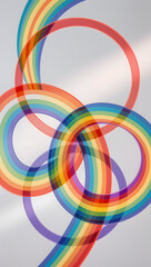 Obraz premium Abstract Rainbow Overlapping Rings on Soft Gradient Background