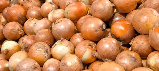 Onions in the market for background. Natural food concept.