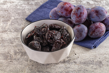 Black dry sweet prunes heap