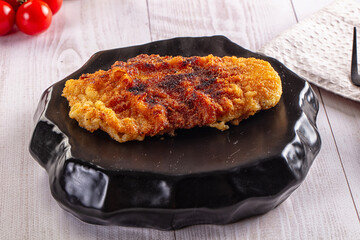 Roasted breaded crispy pork schnitzel