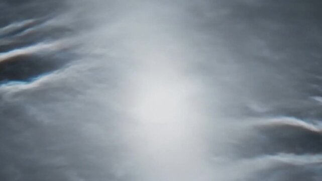 Versatile abstract background element showcasing gentle, shifting luminosity and a liquid like flow, perfect for creative compositing. seamless looping overlay