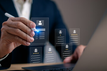 Businessman using digital interface to evaluate candidate profiles with rating and checklist, representing modern recruitment, HR technology, employee selection and data driven hiring