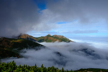 Morning fog and clouds over the mountains.