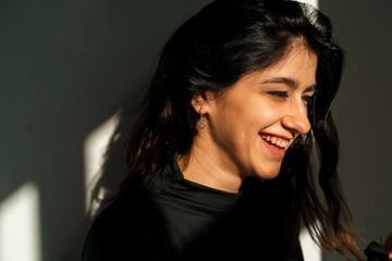 Smiling woman in natural sunlight portrait