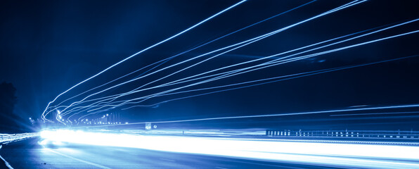 blue car lights at night. long exposure