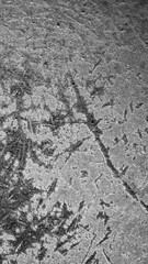 black old aluminum sheet with burnt marks from the pan