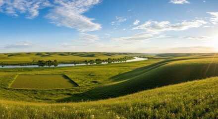 A serene landscape with rolling green hills and a winding river, under a clear blue sky with scattered clouds.