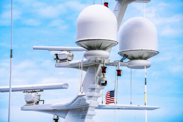Modern yacht radar system in radome and open array antenna  form factor.