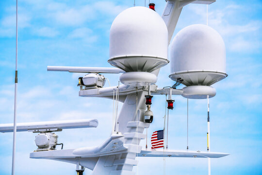 Modern yacht radar system in radome and open array antenna  form factor.