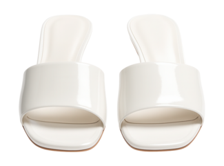 White patent mules with a wide strap and low heel, perfect for minimalist looks.