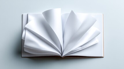 An open book reveals blank pages fanned out, symbolizing potential and creativity, inviting readers to fill it with their stories, dreams, and imagination.