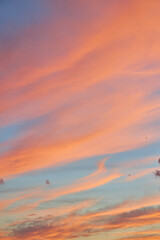 Beautiful pastel sky with pink clouds at sunset.