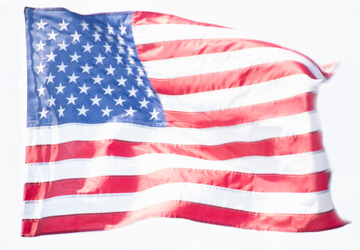 American flag blowing in wind