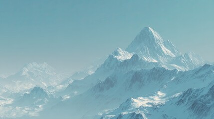 Majestic snow-covered mountain peaks under clear blue sky