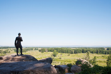 Silhouette of General G. K. Warren statue at Little Round Top