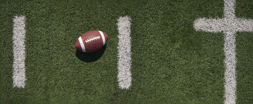 Overhead view of American football on playing field