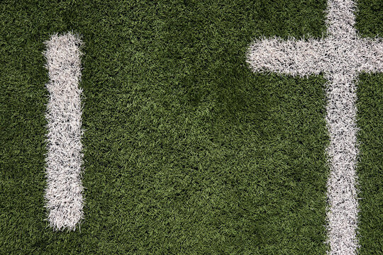 Overhead view of yardage marker on American football field