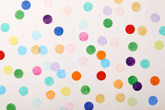 Colorful confetti on white background