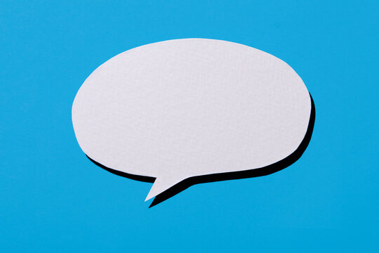 Blank thought bubble on blue background