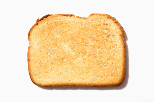 Studio shot of slice of toasted bread on white background