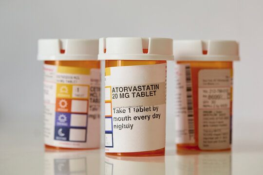 Studio shot of statin pill bottles