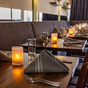 Row of bistro restaurant table settings